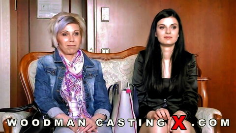Mature blonde mom and young black-haired teen sit clothed in Woodman casting interview