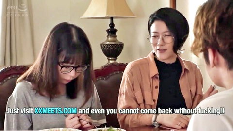 Two sexy Asian women with glasses in tight tops chatting at dinner table before wild creampie fuck