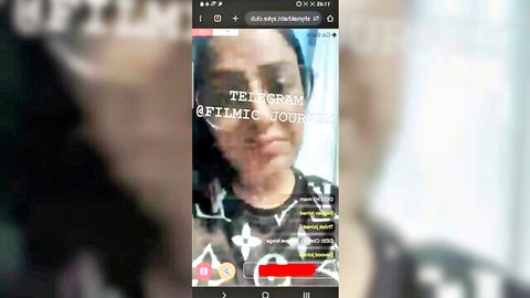 South Asian woman in sunglasses and designer top on Telegram webcam stream