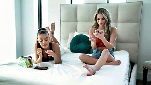 Athena Faris and Vanna Bardot tease on bed in crop tops and shorts, threesome preview