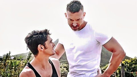 Devin Franco and Tomas Brand in outdoor muscular gay embrace