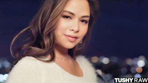 Scarlett's seductive smile in fluffy white top, city night vibe, TUSHY RAW anal tease