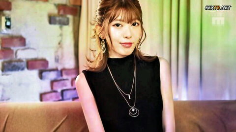 Miyuki Arisaka smiling in sleek black turtleneck top