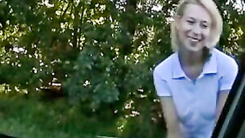 Busty blonde babe smiling in car window after hot fuck and messy facial