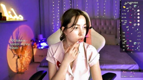 Sarahson in pink top with kissy lips on webcam show