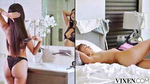 Eliza Ibarra in black lace lingerie brushing hair, nude on bed teasing