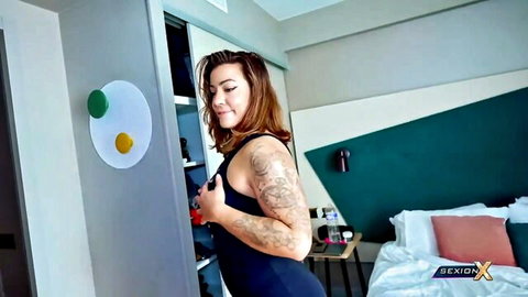Freyja Swann French MILF in tight black dress, teasing with tattoos