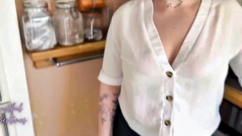 Tattooed MILF teasing cleavage in open white blouse shirt