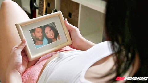 Sidney Alexis in pink panties holding Ramon Nomar photo, teasing in FamilyXXX