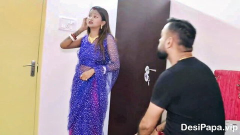 Sexy Indian housewife in sheer blue saree teases bearded desi guy sitting nearby