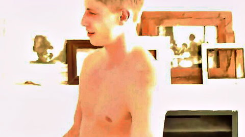 Shirtless blonde hunk Gino Mosca in hot stripper pose with Joel Birrer