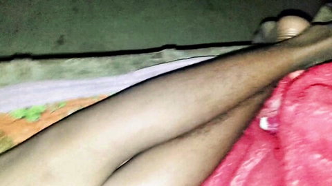 Hairy South Asian man exposing brown ass cheeks from pulled-down red underwear on bed