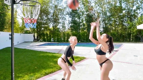 Carter Cruise and Lela Star in bikinis playing basketball outdoors