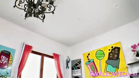 Nina Pink in vibrant pop art room, teasing for wet spit blowjob on Swallowed
