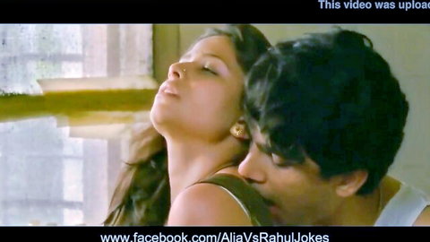 Steamy South Asian beauty tilts head back moaning as lover kisses her neck passionately