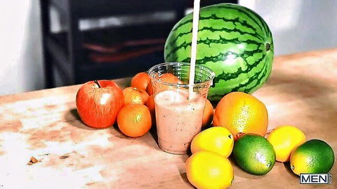 Juicy watermelon slice pierced by thick white straw with pink smoothie and fresh fruits on table