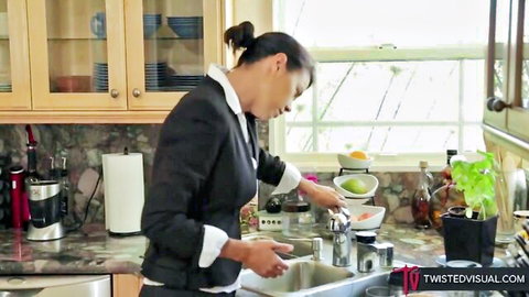 Sexy Asian MILF in tight business suit washes dishes bending over kitchen sink