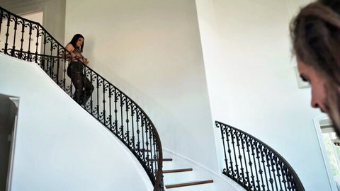 Busty Ella Knox in black lingerie climbs stairs as Donte Inferno watches