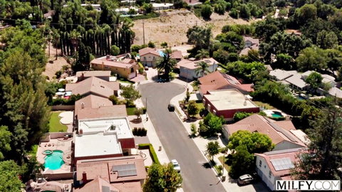 Suburban neighborhood aerial view for Reagan Foxx's first BBC MILF scene
