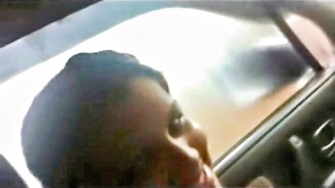Malayali GF with dark hair smiling during car blowjob session