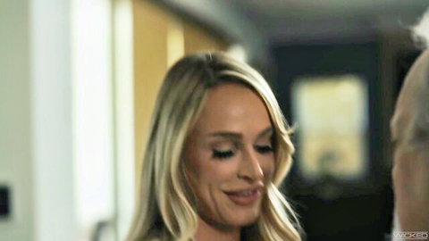 Emma Hix smiling seductively in The Hunger Saga Episode 2