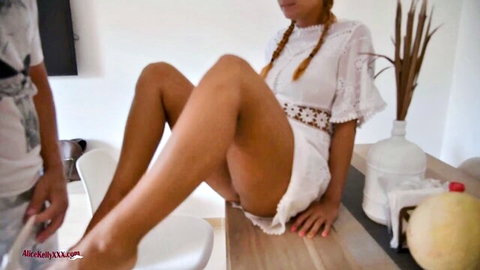 Ebony nubile's juicy shaved pussy exposed in white dress, passionate licking