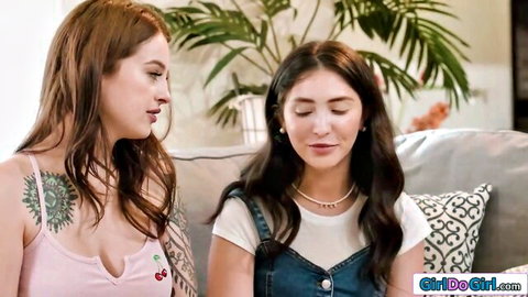 Maddy May and Jane Wilde in close intimate moment, tattoos and casual outfits