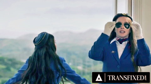 Busty brunette stewardesses in uniforms tease in kinky lesbian scene