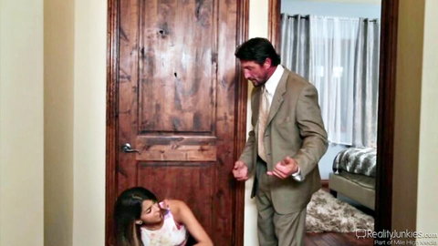Sophia Leone kneeling in pink top as horny brunette babysitter
