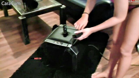 CaraCum nude handling big dildo on sex machine