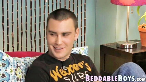 Preston Andrews smiling in casual t-shirt and jeans, seductive pose
