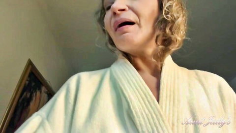 Naughty granny in open robe flashes cleavage with ecstatic O-face pleasure
