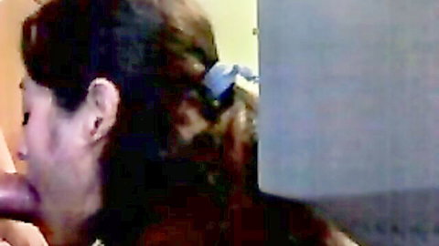 Brunette with ponytail eagerly sucks thick black cock in closeup blowjob