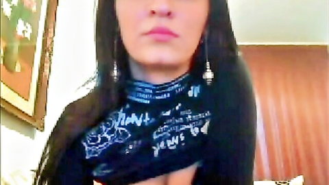 Naughty webcam babe with perky tits teases in low-cut top and scarf