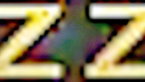 Yellow ZZZ watermark prominently displayed on dark blurred background