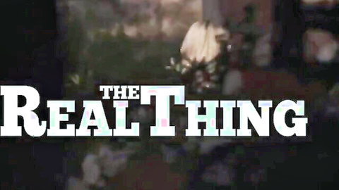 The Real Thing bold white title text on dark blurry floral background