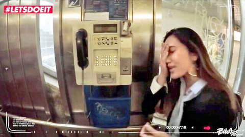 May Thai as embarrassed Chinese tourist at public payphone