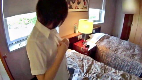 Asian woman in white school shirt from behind in bedroom POV tease