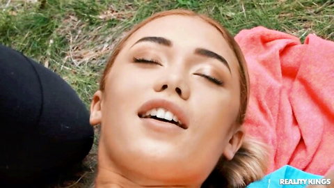 Brittany Bardot smiling blissfully in outdoor FFM threesome with Nick Ross
