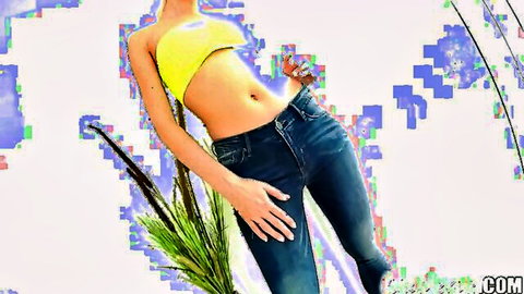 Blonde babe in yellow bandeau top and tight jeans showing toned midriff