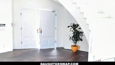 Empty luxurious home interior with white doors curved stairs and plant from Daughterswap