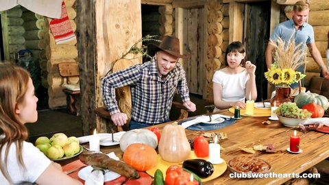 Nicole and friends at Thanksgiving table in cozy holiday setup before steamy threesome action