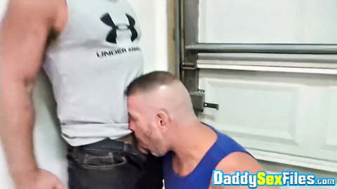 Clay Towers kneels for sloppy BJ on Jacob Woods' bulge in tank top and jeans