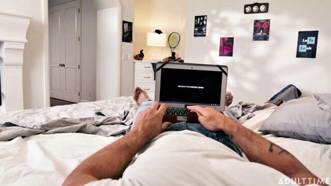 Shirtless stud with huge cock bulge in tight white underwear uses laptop on bed