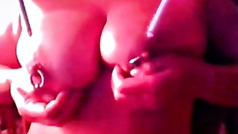 Amateur nympho shows off massive pierced nipples and huge tits
