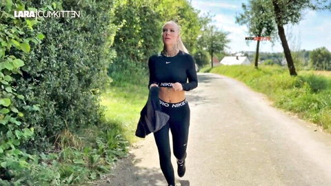 Blonde babe in tight Nike leggings and sports bra jogging outdoors flaunting bubble butt