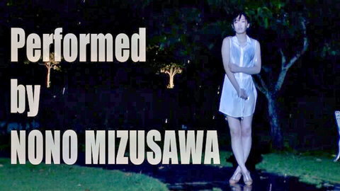 Nono Mizusawa in seductive white dress posing outdoors at night