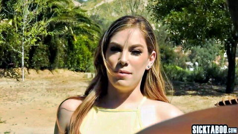 Bobbi Dylan in yellow halter top outdoors, teasing for taboo interracial fun