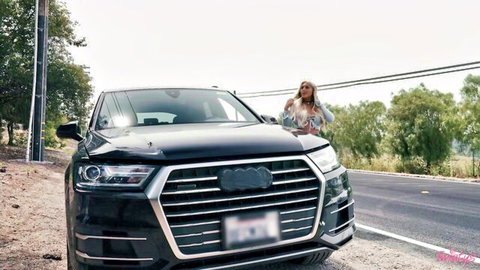 Kayley Gunner poses busty in denim jacket by luxury car in When Girls Play