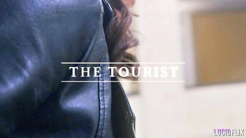 Redhead woman in black leather jacket from behind, The Tourist episode 4K